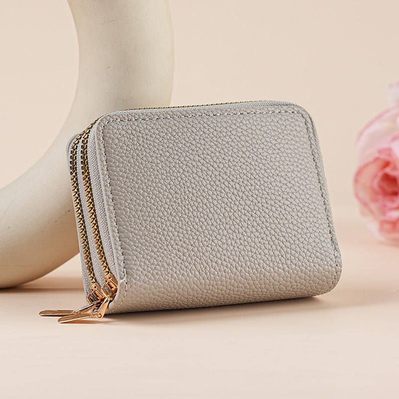 Clutch Wallet With Dual Zippers And Multiple Card Slots